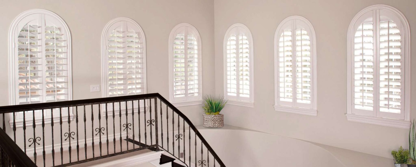 Arched shutters on windows